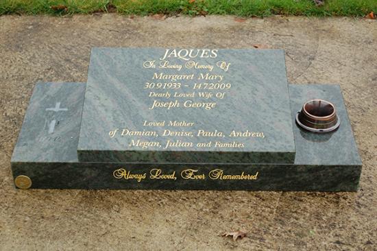 Low rise memorial in a square shape crafted from granite by Stoneworx - Memorials of Distinction in New Zealand.