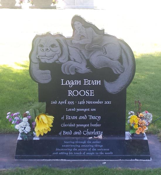 Custom headstone with lions carved into the headstones crafted from granite by Stoneworx - Memorials of Distinction in New Zealand.