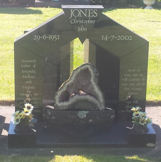 Custom shape headstone with amethyst crafted from granite by Stoneworx - Memorials of Distinction in New Zealand.