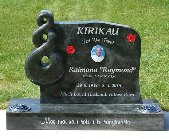 Custom headstone design with a carved koru crafted from granite by Stoneworx - Memorials of Distinction in New Zealand.