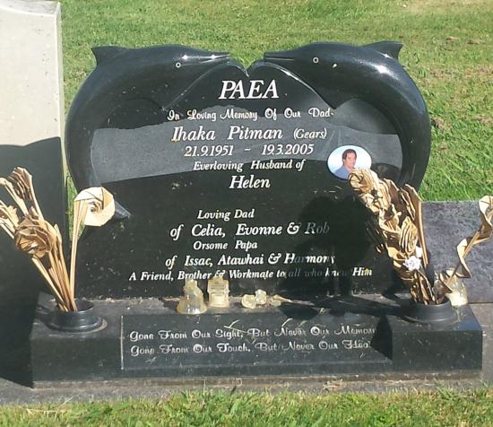 Custom headstone design with dolphins crafted from granite by Stoneworx - Memorials of Distinction in New Zealand.