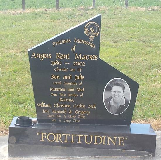 Custom headstone in an irregular shape crafted from granite by Stoneworx - Memorials of Distinction in New Zealand.