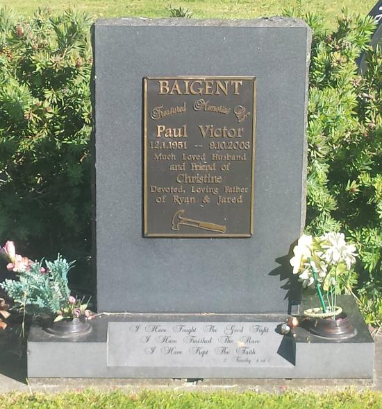 Custom headstone with rough edges on stone with a metal plaque crafted from granite by Stoneworx - Memorials of Distinction in New Zealand.