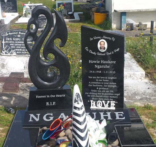Custom headstone design with a carved koru crafted from granite by Stoneworx - Memorials of Distinction in New Zealand.