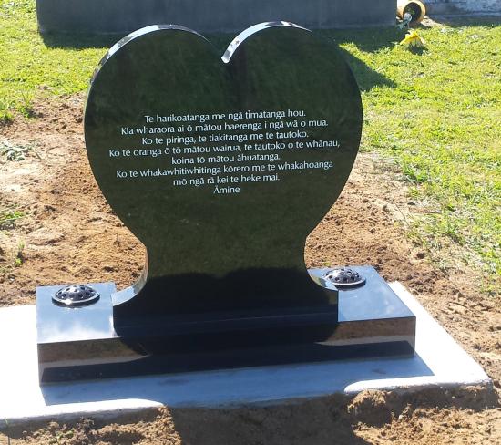 The back view of a custom heart shape headstone  crafted from granite by Stoneworx - Memorials of Distinction in New Zealand.