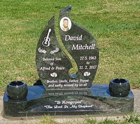 Custom teardrop design with a cut out koru design  crafted from granite by Stoneworx - Memorials of Distinction in New Zealand.