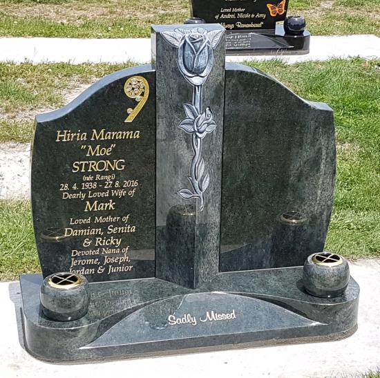 A custom shape headstone with carved rose in the centre column crafted from granite by Stoneworx - Memorials of Distinction in New Zealand.