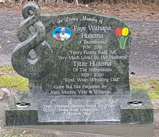 Custom headstone with koru crafted from granite by Stoneworx - Memorials of Distinction in New Zealand.
