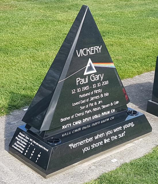 Custom headstone design for a pink floyd fan in the prism shape with a rainbow crafted from granite by Stoneworx - Memorials of Distinction in New Zealand.