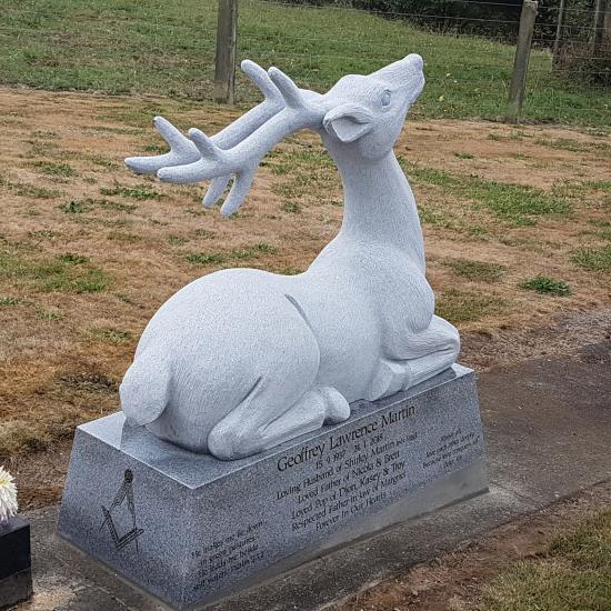 Custom headstone in the shape of a deer crafted from granite by Stoneworx - Memorials of Distinction in New Zealand.
