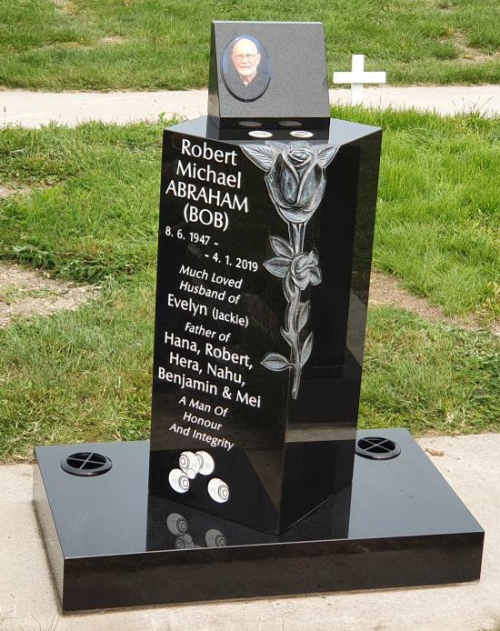 Custom pillar headstone with carved rose crafted from granite by Stoneworx - Memorials of Distinction in New Zealand.