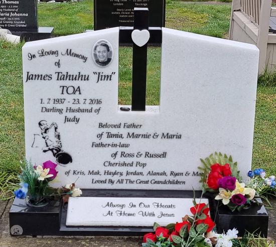 Headstone crafted from granite by Stoneworx - Memorials of Distinction in New ZealandCustom headstone in white with a black cross for two people