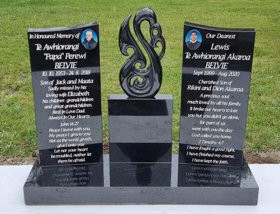 Custom companion headstone with two pieces and a koru in the centre crafted from granite by Stoneworx - Memorials of Distinction in New Zealand.