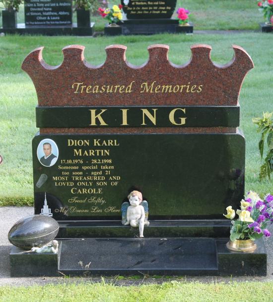 Custom shaped headstone crafted from granite by Stoneworx - Memorials of Distinction in New Zealand.