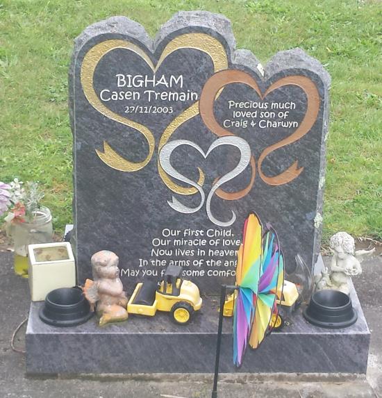 Custom Headstone with triple heart design crafted from granite by Stoneworx - Memorials of Distinction in New Zealand.