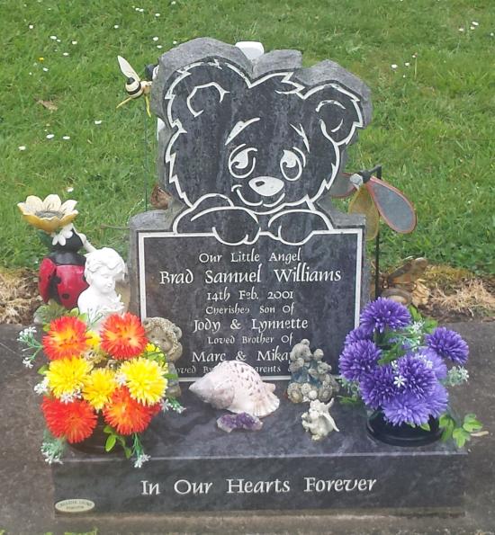 Custom headstone with teddy bear crafted from granite by Stoneworx - Memorials of Distinction in New Zealand.