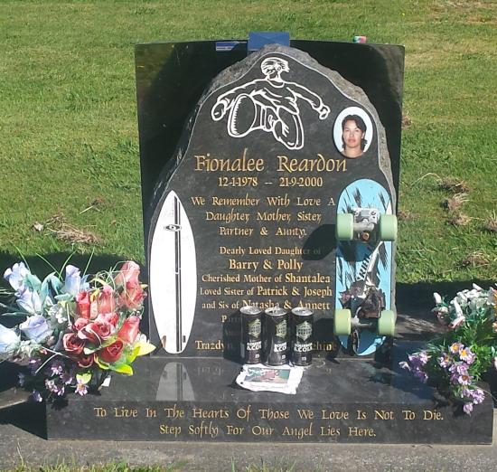Custom headstone design with surfboard crafted from granite by Stoneworx - Memorials of Distinction in New Zealand.