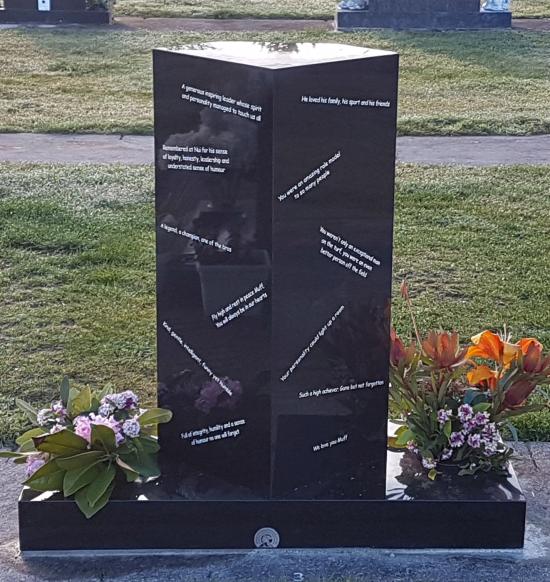 Custom headstone with football crafted from granite by Stoneworx - Memorials of Distinction in New Zealand.