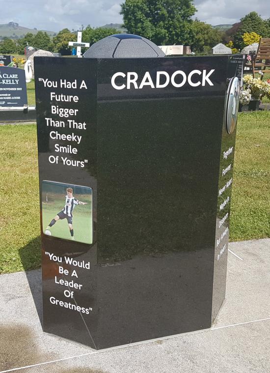 Custom headstone with football crafted from granite by Stoneworx - Memorials of Distinction in New Zealand.