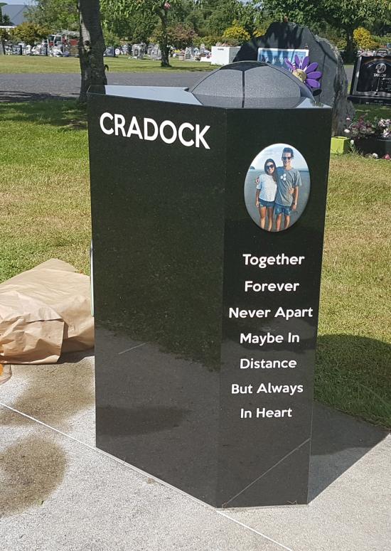 Custom headstone with football crafted from granite by Stoneworx - Memorials of Distinction in New Zealand.