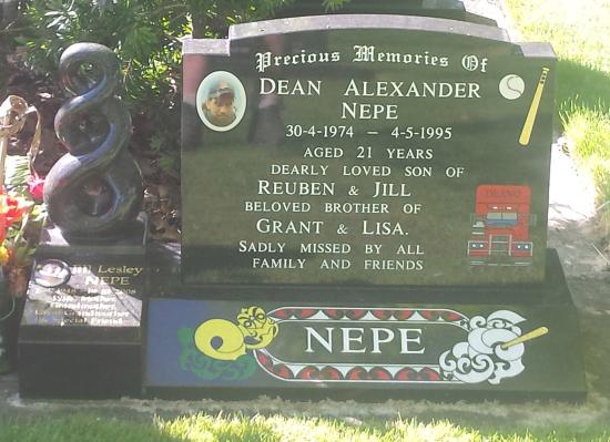 Classic upright headstone with low saddle top with checks crafted from granite by Stoneworx - Memorials of Distinction in New Zealand.