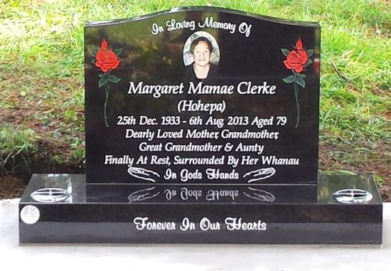 Classic upright headstone with high saddle top crafted from granite by Stoneworx - Memorials of Distinction in New Zealand.