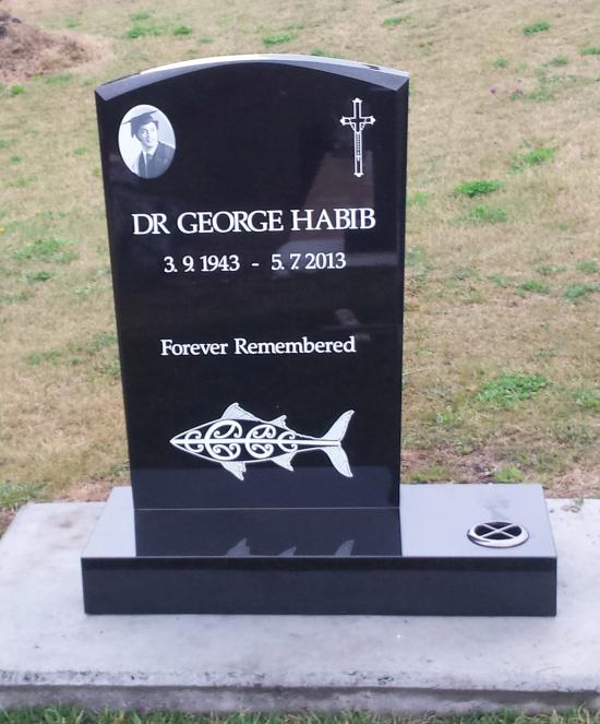 Classic upright tall headstone in a beveled camber shape crafted from granite by Stoneworx - Memorials of Distinction in New Zealand.
