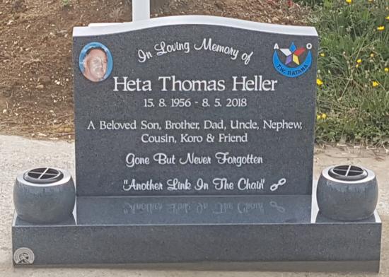 Classic upright headstone with low saddle top crafted from granite by Stoneworx - Memorials of Distinction in New Zealand.