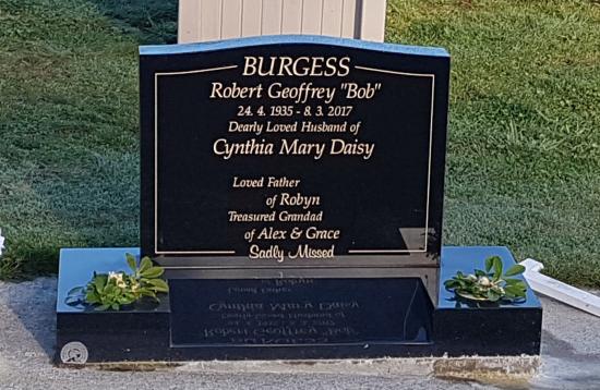 Classic upright headstone with low saddle top crafted from granite by Stoneworx - Memorials of Distinction in New Zealand.