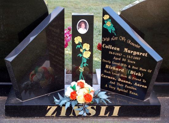 Companion headstone with opposing angled tops and centre pillar  crafted from granite by Stoneworx - Memorials of Distinction in New Zealand.