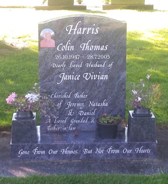 Classic upright tall headstone in a camber top shape crafted from granite by Stoneworx - Memorials of Distinction in New Zealand.
