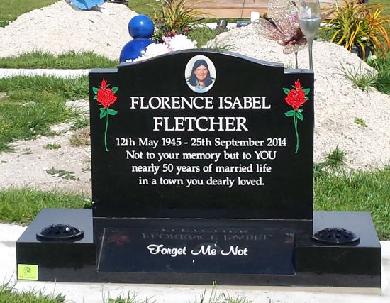Classic upright headstone in the ‘high saddle with checks’ shape crafted from granite by Stoneworx - Memorials of Distinction in New Zealand.