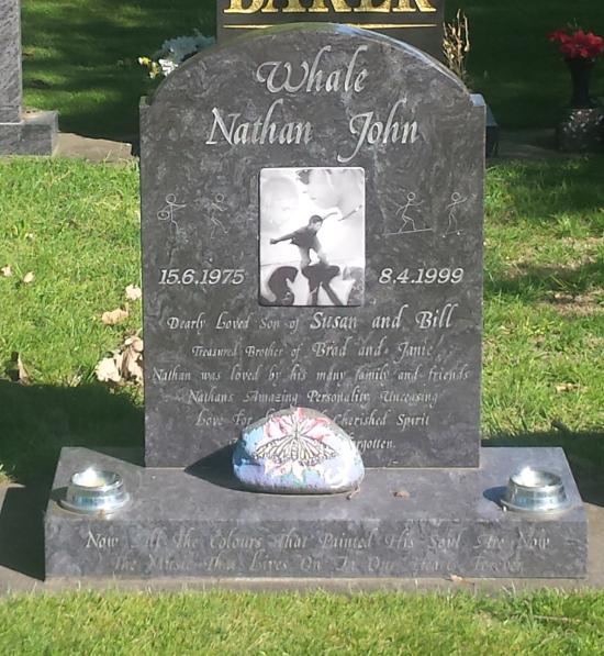 Classic upright tall headstone in a radius top shape with checks crafted from granite by Stoneworx - Memorials of Distinction in New Zealand.