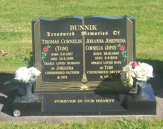 Classic upright headstone in the ‘book’ shape crafted from granite by Stoneworx - Memorials of Distinction in New Zealand.