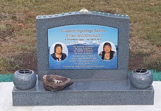 Classic upright headstone with low saddle top crafted from granite by Stoneworx - Memorials of Distinction in New Zealand.