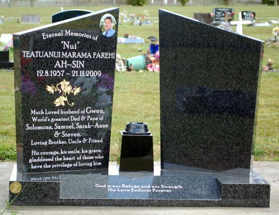 Companion headstone with opposing angled tops and small centre pillar  crafted from granite by Stoneworx - Memorials of Distinction in New Zealand.