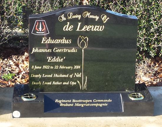 Classic upright headstone with high saddle top crafted from granite by Stoneworx - Memorials of Distinction in New Zealand.