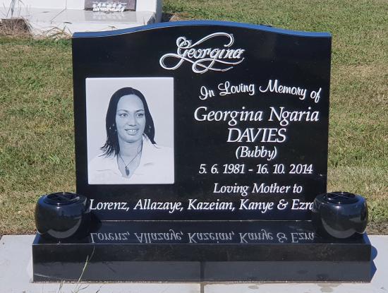 Classic upright headstone with low saddle top crafted from granite by Stoneworx - Memorials of Distinction in New Zealand.