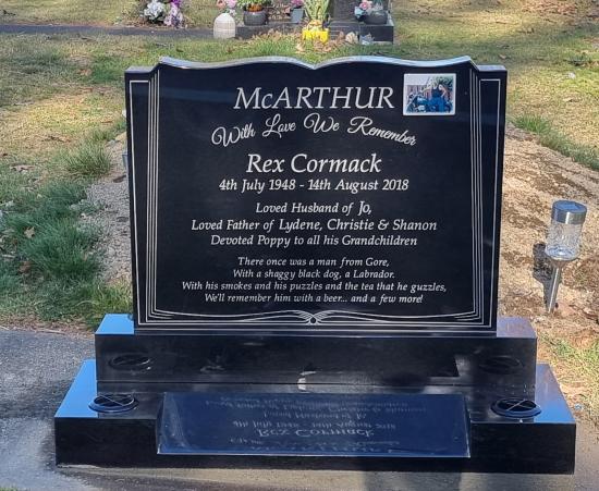 Classic upright headstone in the ‘book’ shape crafted from granite by Stoneworx - Memorials of Distinction in New Zealand.