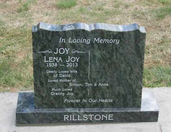 Classic upright headstone with a book shape top crafted from granite by Stoneworx - Memorials of Distinction in New Zealand.