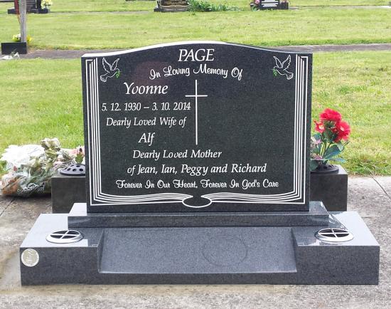 Classic upright headstone with low saddle top crafted from granite by Stoneworx - Memorials of Distinction in New Zealand.