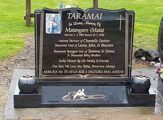 Classic upright headstone in the ‘book’ shape crafted from granite by Stoneworx - Memorials of Distinction in New Zealand.