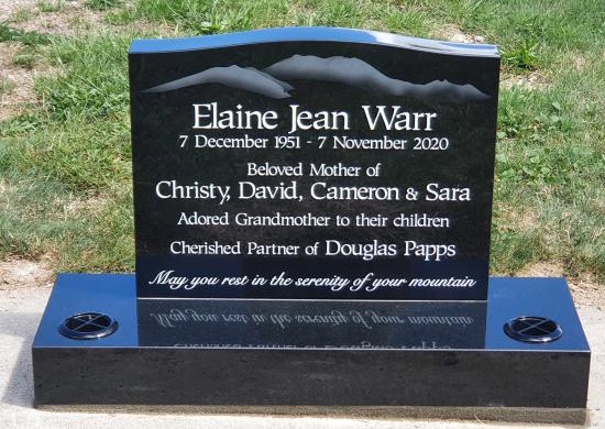 Classic upright headstone with low saddle top crafted from granite by Stoneworx - Memorials of Distinction in New Zealand.