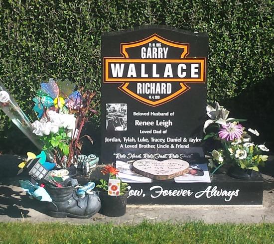Classic upright tall headstone in a high saddle shape crafted from granite by Stoneworx - Memorials of Distinction in New Zealand.