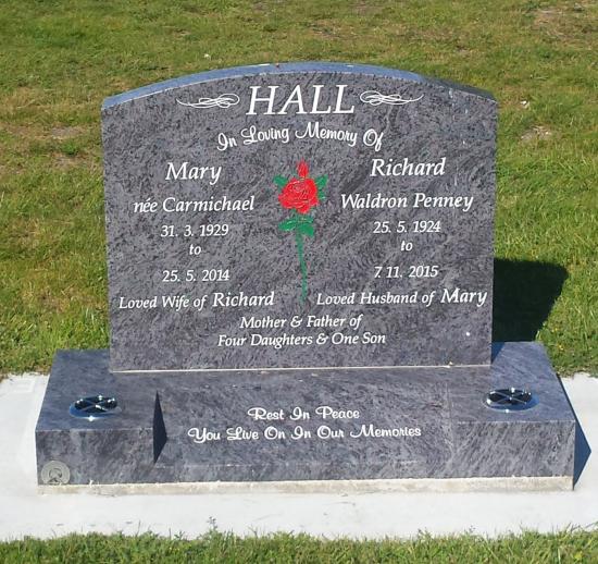 Classic upright headstone with low saddle top crafted from granite by Stoneworx - Memorials of Distinction in New Zealand.
