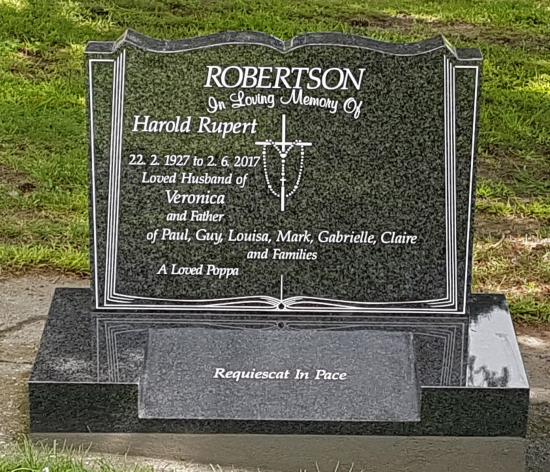 Classic upright headstone in the ‘book’ shape crafted from granite by Stoneworx - Memorials of Distinction in New Zealand.