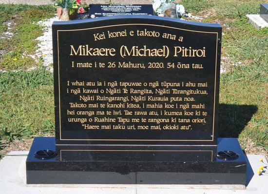 Classic upright headstone with low saddle top crafted from granite by Stoneworx - Memorials of Distinction in New Zealand.