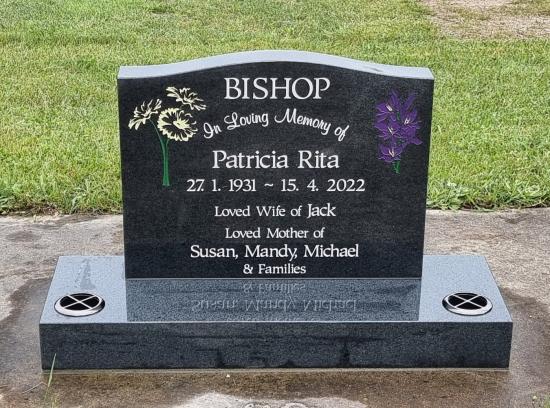 Classic upright headstone with low saddle top crafted from granite by Stoneworx - Memorials of Distinction in New Zealand.