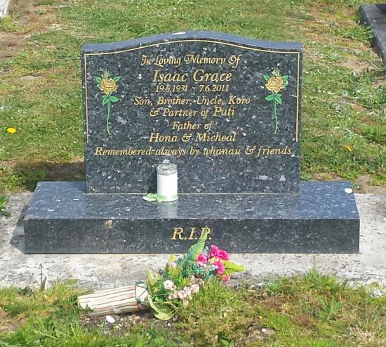 Classic upright headstone with low saddle top crafted from granite by Stoneworx - Memorials of Distinction in New Zealand.
