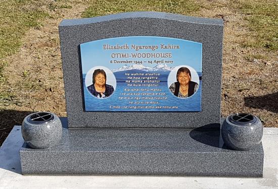 Classic upright headstone with low saddle top crafted from grey granite by Stoneworx - Memorials of Distinction in New Zealand.